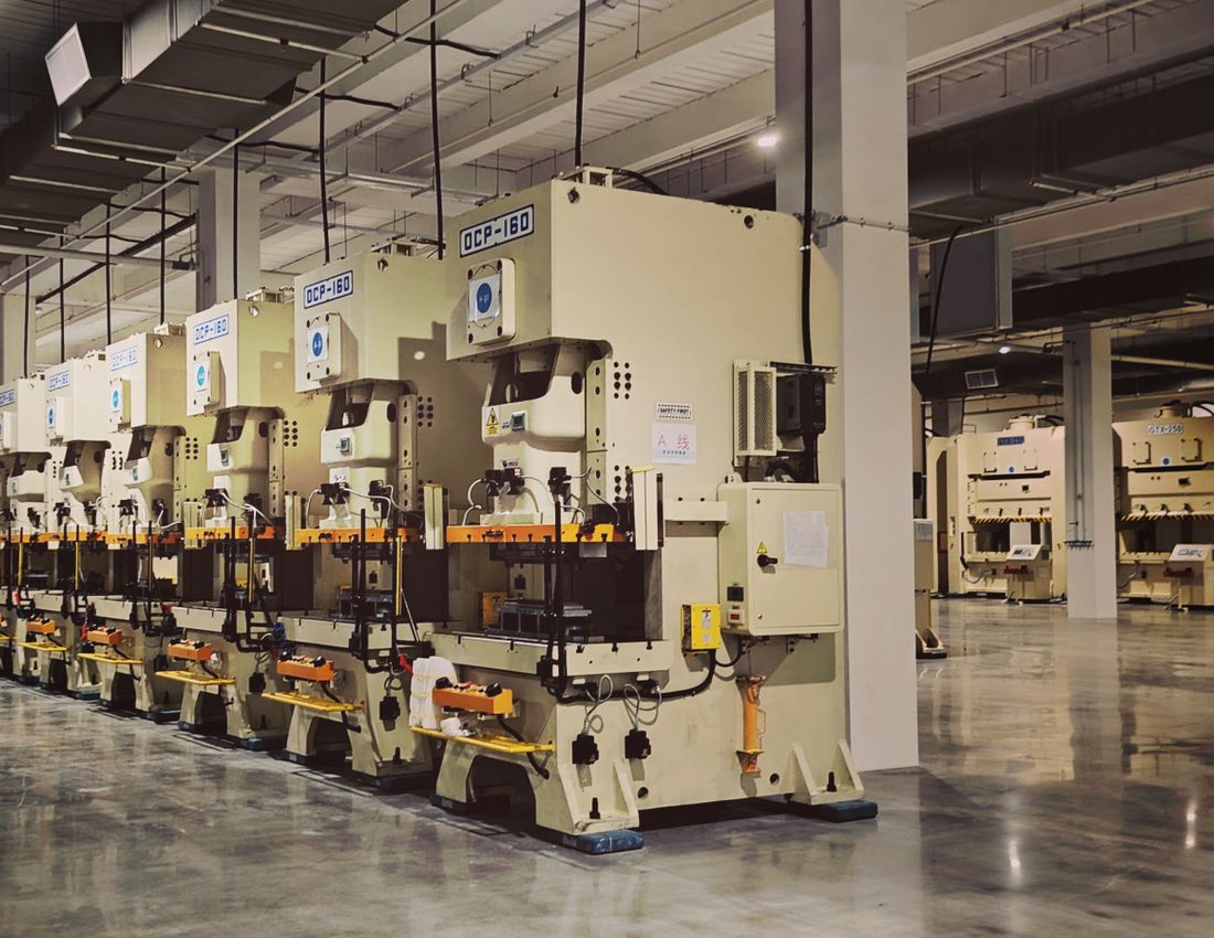 Illustrative stock photo: Industrial machinery on a factory floor.